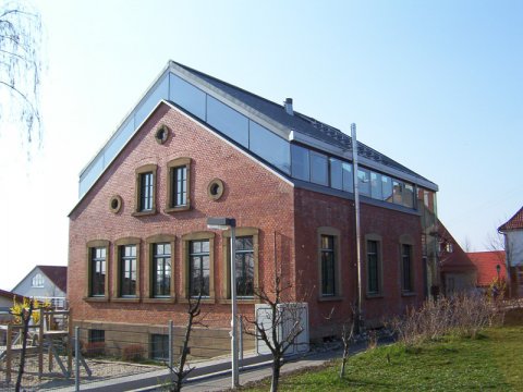 Schmid_Bau_Sanierung Sichtmauerwerk Beton Abbruch Aufzug Sichtbeton Kanalarbeiten